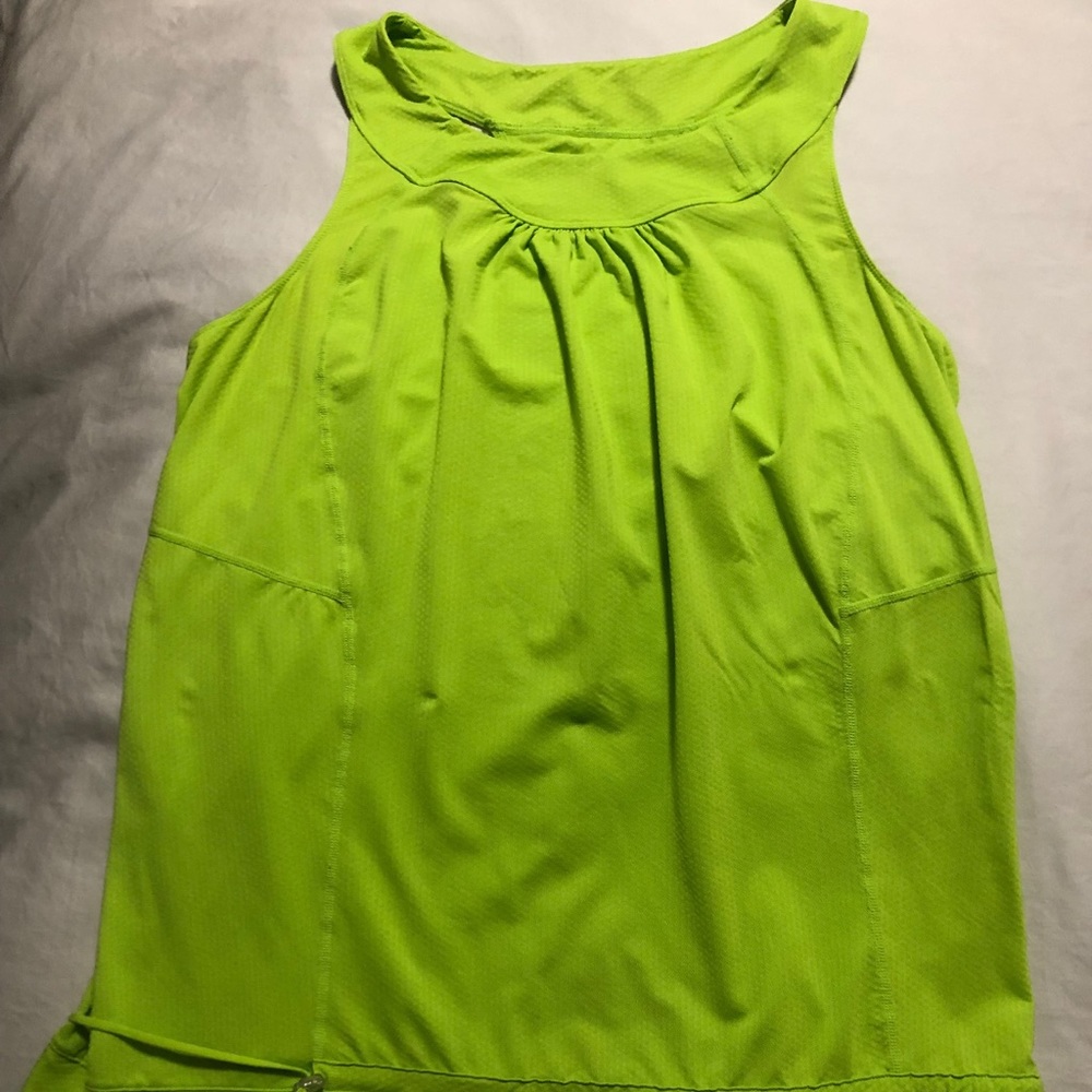 Racerback yoga T-shirt, drawstring at hip line.